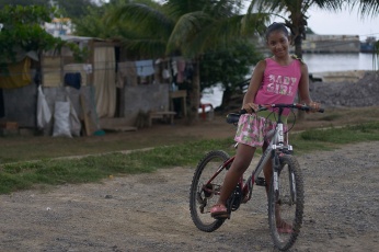 Girl with a Bicycle in Roatan, Honduras