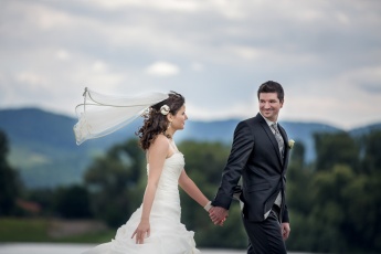 Wedding Couple Walking in Wind