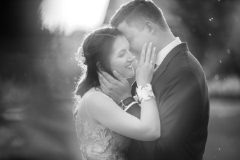 Wedding couple faces together in black and white
