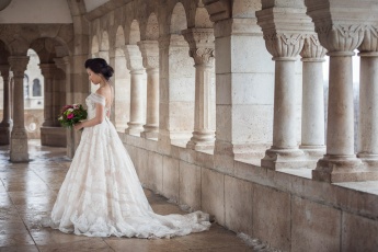 Bride with a bouquet at Fisherman's Bastion pre-wedding photo shoot in Budapest