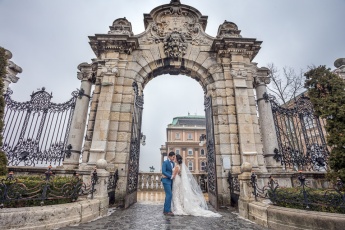 Wedding couple standing at Gate Vienna at Buda Castle in Hungary