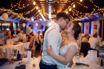 Romantic Kissing at a Wedding