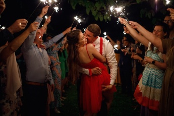 Wedding couple walking in sparklers in Hungary